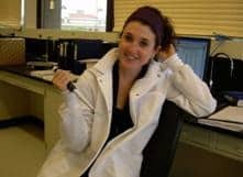 Jenna Monaster holding a pipette